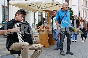 The young man plays the accordion in Lublin