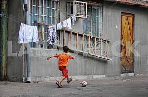 Boy playing ball