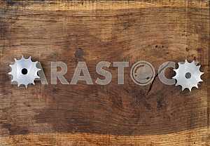 Different construction tools on a wooden background - screwdriver, caliper.