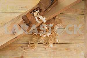 Carpenter tools on wooden table with sawdust. Circular Saw.