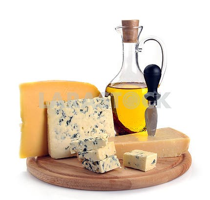 collection of cheeses and olive oil