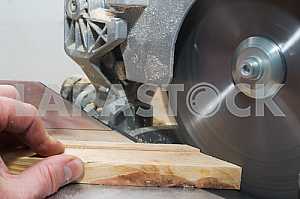 Carpenter tools on wooden table with sawdust. Circular Saw.