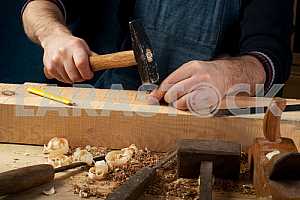 Carpenter tools on wooden table with sawdust. Circular Saw.