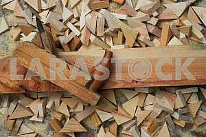 Different construction tools on a wooden background - screwdriver, caliper.