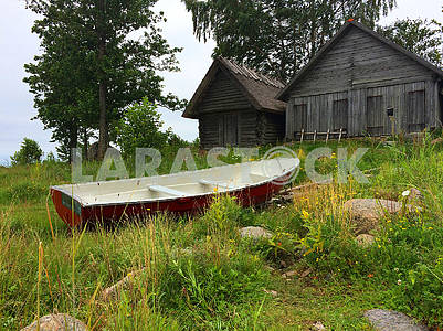 Boat and wooden buildings