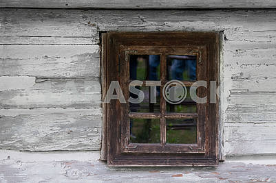Vintage wooden  window of old wooden house. Background of wooden