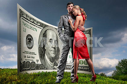 Portrait young beautiful couple. money, 100 american dollars
