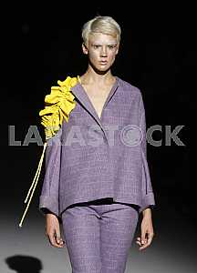 The model demonstrates outfit by Ukrainian designer Katya Silchenko