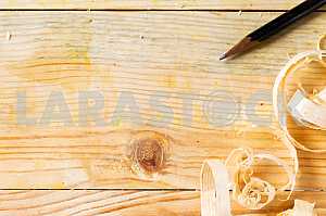 Carpenter tools on wooden table with sawdust. Circular Saw.