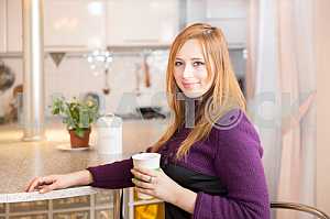 Young happy couple drinking tea in the morning