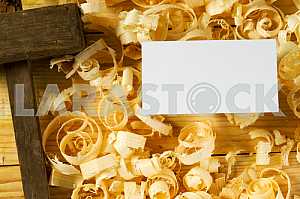 Carpenter tools on wooden table with sawdust. Circular Saw.