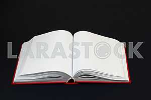 Open book, stack of hardback books on wooden table. Back to school. Copy space