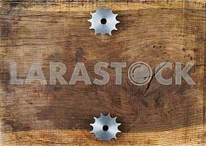 Different construction tools on a wooden background - screwdriver, caliper.