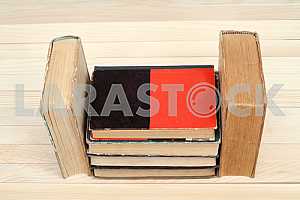 Stack of hardback books isolated on white background. Back to school. Copy space