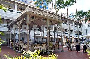 Singapore, a bar in the hotel courtyard Raffles