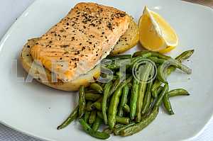 Fried red fish with greens
