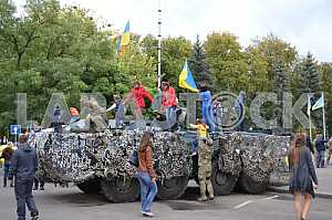 Children on an APC in Kramatorsk
