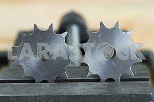 Different construction tools on a wooden background - screwdriver, caliper.
