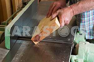Carpenter tools on wooden table with sawdust. Circular Saw. Carpenter workplace top view