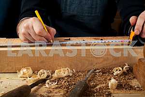 Carpenter tools on wooden table with sawdust. Circular Saw.