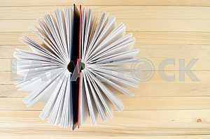 Stack of hardback books on wooden table. Back to school. Copy space