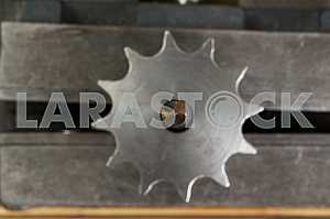 Different construction tools on a wooden background - screwdriver, caliper.