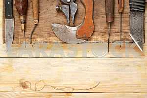 Carpenter tools on wooden table with sawdust. Circular Saw.