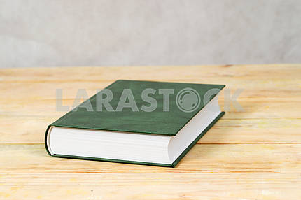 Book on wooden table. Back to school. Copy space