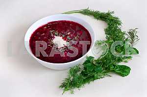 Traditional Ukrainian borsch with sour cream