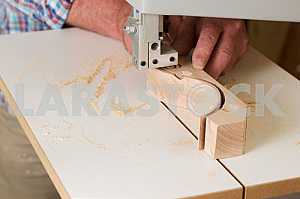 Carpenter tools on wooden table with sawdust. Circular Saw. Carpenter workplace top view