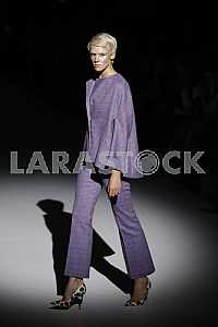 The model in violet demonstrates outfit by Ukrainian designer Katya Silchenko