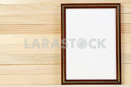Frame on wooden wall. Interior Design. Copy space