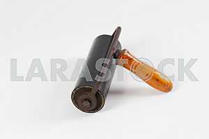 Different construction tools on a wooden background - screwdriver, caliper.