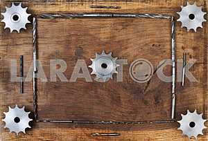 Different construction tools on a wooden background - screwdriver, caliper.