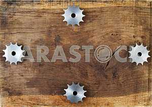 Different construction tools on a wooden background - screwdriver, caliper.