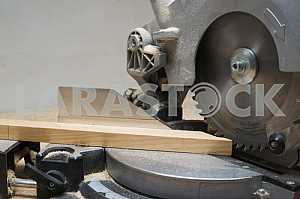 Carpenter tools on wooden table with sawdust. Circular Saw.