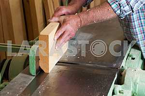 Carpenter tools on wooden table with sawdust. Circular Saw. Carpenter workplace top view