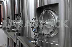 Row of tanks in microbrewery