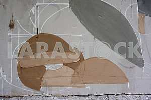 Fragment of grafiti on a concrete wall.Abstract background.