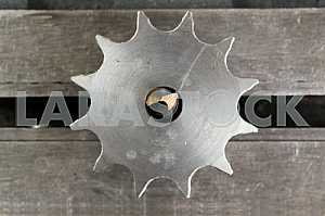 Different construction tools on a wooden background - screwdriver, caliper.