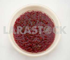 Red currant in water