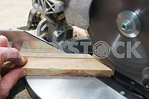 Carpenter tools on wooden table with sawdust. Circular Saw.
