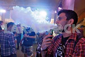 People smoke electronic cigarettes