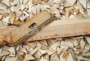 Different construction tools on a wooden background - screwdriver, caliper.