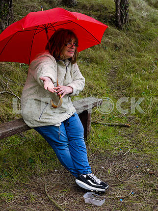 Woman Checking for Rain