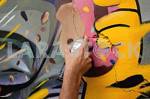 Fragment of grafiti on a concrete wall.Abstract background.