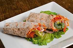 Vegetables with sour cream, wrapped in bread of pita