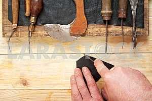 Carpenter tools on wooden table with sawdust. Circular Saw.