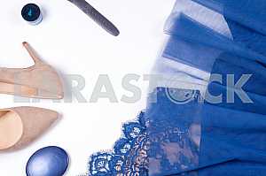 Woman clothes and accessories. Soft blue colors female apparel.
