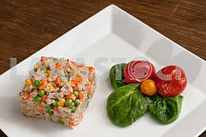 Vegetable garnish with rice and pickled tomatoes
